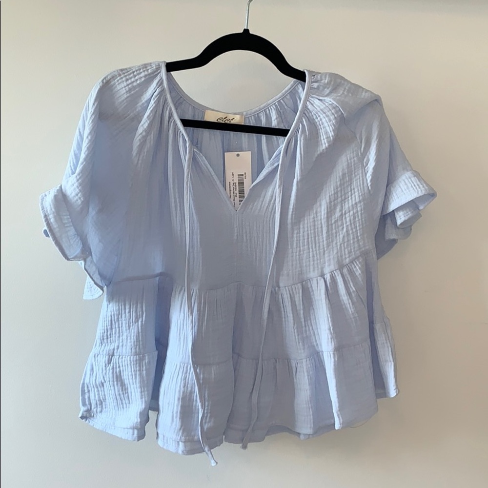Light blue baby doll top. Brand new with tags!!